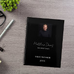 Black white name signature photo business 2025 planner<br><div class="desc">A classic black background. Personalize and add your photo,  name and title or a text. Modern,  trendy and simple. For both him and her. 
Back: add your business logo,  web address (or delete)</div>