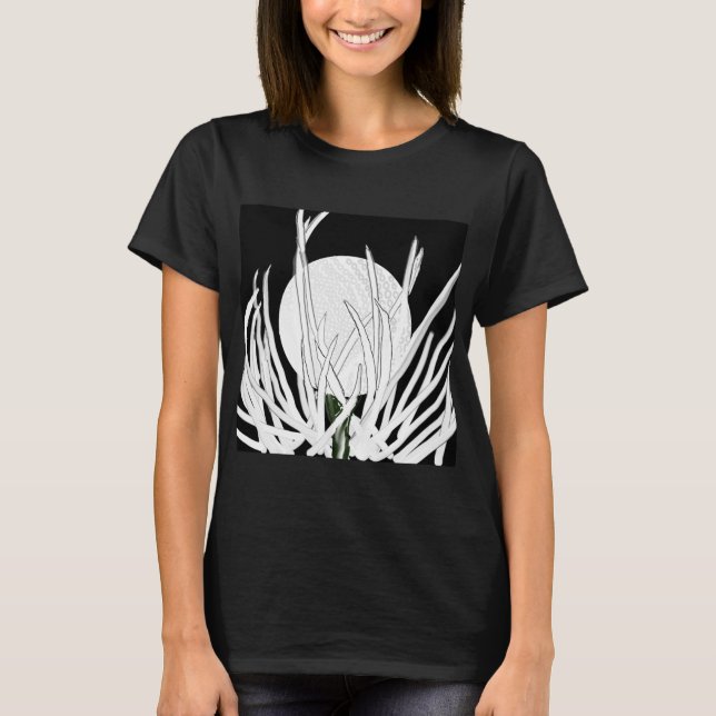 Black & White T-Shirt Golf Ball in Grass (Front)