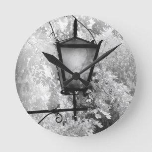 Black & White view of light fixture Round Clock