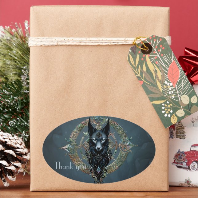 Black wolfs head with piercing blue eyes, oval sticker (Holiday)