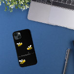 Black yellow bees summer name iPhone 13 case<br><div class="desc">Decorated with happy, smiling yellow and black bumblebees. A chic black background. Personalize and add your name. The name is written with a modern hand lettered style script. White coloured letters. To keep the swashes only delete the sample name, leave the spaces or emoji's in front and after the name...</div>