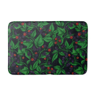 Blackberries on dark gray bath mat