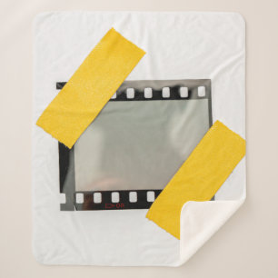 blank or empty 35mm dia film frame fixed by two ye sherpa blanket