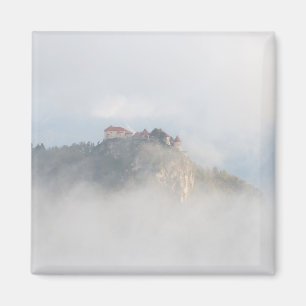Bled castle surrounded by clouds magnet