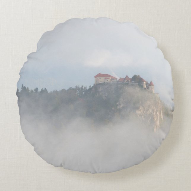 Bled castle surrounded by clouds round pillow (Front)