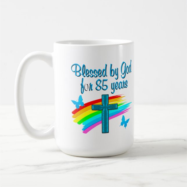 BLESS BY GOD FOR 85 YEARS BLUE CROSS DESIGN COFFEE MUG (Left)