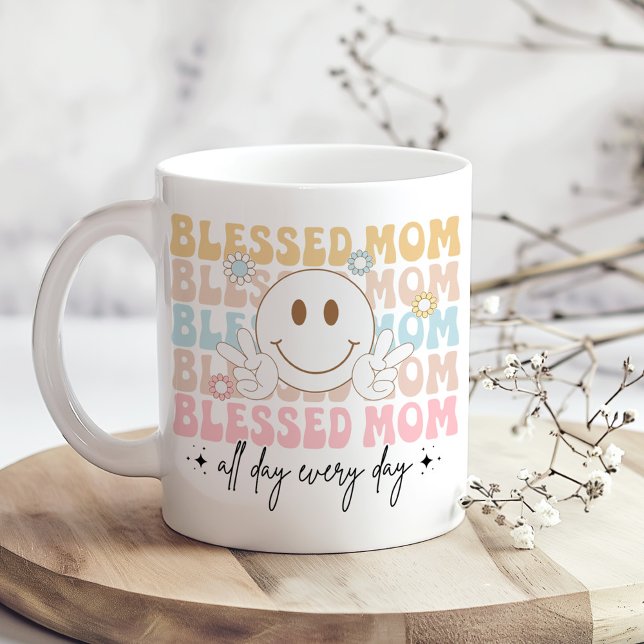 "Blessed Mom" Mother's Day Pastel Coloured Hippie Coffee Mug ("Blessed Mom" Mother's Day Pastel Colored Hippie Coffee Mug on a boho kitchen table with flowers)