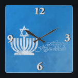 Blessings of the Menorah Square Wall Clock<br><div class="desc">10.75” x 10.75” acrylic clock with an image of a pale blue and white menorah topped with a Star of David on grungy blue. See the entire Hanukkah Clock collection under the HOME category in the HOLIDAYS section.</div>