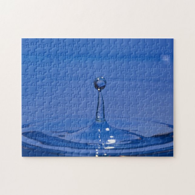 Bleu goutte d'eau en mouvement sur un puzzle (Horizontal)