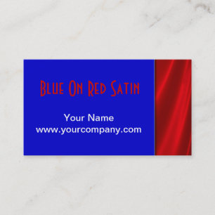 Bleu sur les cartes de visite rouges de satin