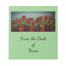 Geraniums rouges en pots d'argile