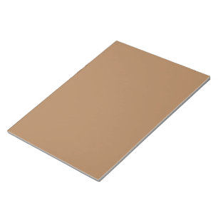 Bloc-note un arrière - plan marron avec une bordure blanche_
