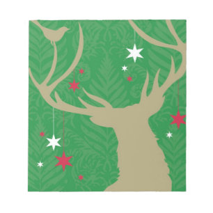 Bloc-note Une silhouette d'un cerf commun avec des étoiles