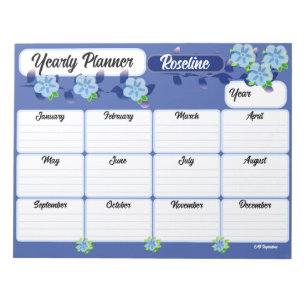 Bloc-notes du planificateur annuel des fleurs bleu