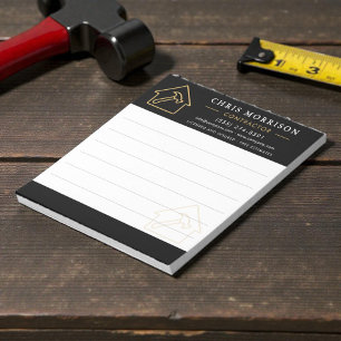 Bloc-notes noir or de l'entreprise de construction