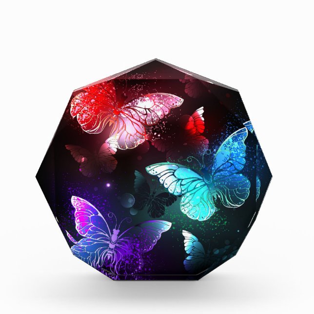 Bloc Photo Trois papillons brillants sur l'arrière - plan de  (Devant)