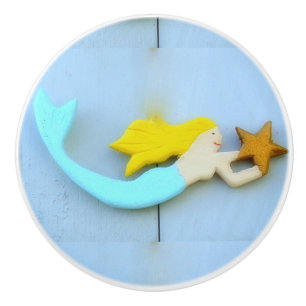 blonde mermaid carrying a star ceramic knob