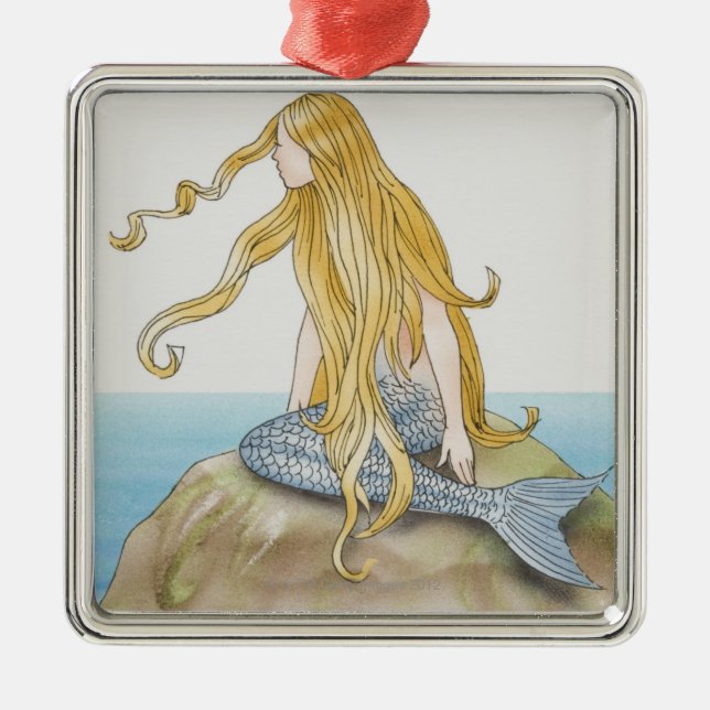 Blonde mermaid sitting on sea rock, side view. metal ornament (Front)