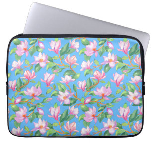 Blooming magnolia on sky blue laptop sleeve