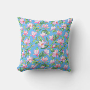 Blooming magnolia on sky blue throw pillow