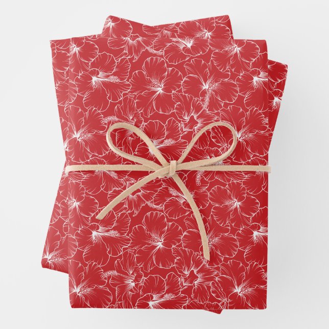 Blooming White Hibiscus Flowers on Red Wrapping Paper Sheet (In situ)