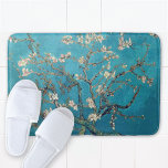 Blossoming Almond Tree by Vincent van Gogh Bath Mat<br><div class="desc">A bathmat with Vincent van Gogh's,  Blossoming Almond Tree (1890),  also known as Almond Blossoms,  an oil painting from the post-Impressionist period,  depicting a springtime tree branch in bloom with white and pink flowers against a blue sky.</div>