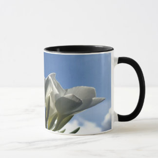 Blossoming Plumeria Against a Radiant Sky Mug