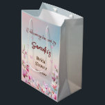 Blossoming Romance - Bridal Shower Gift Bag<br><div class="desc">Celebrate the bride-to-be with our exquisite personalized bridal shower gift bag! Crafted with love, this charming bag features a radiant pastel gradient, blossoming with floral elegance at each corner. Customize it with the future bride's name and shower date to encapsulate memories of her special day. Perfect for party favours or...</div>