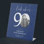 Blue 90th Birthday Welcome Sign | Look Who's 90<br><div class="desc">Welcome guests to your 90th birthday celebration with this stunning editable welcome sign. Featuring a sleek, customizable layout, this template allows you to easily add your own photo and personalize the text, making it a perfect addition to your milestone 90th birthday decor. Ideal for entryways or as a party focal...</div>