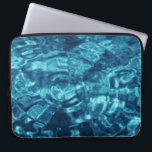 Blue Abstract Laptop Sleeve<br><div class="desc">Blue water ripples create a pattern of elliptical rings in this abstract photo. The colours in the cyanotype range from light blue to navy. 

 

 Digital,  colour photograph. 
 Copyright © 2012 Claire E. Skinner. All rights reserved.</div>