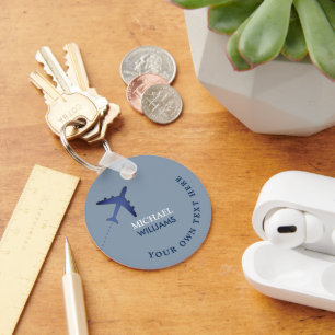 blue airplane keychain with name