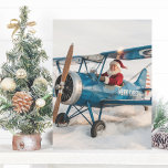 Blue Airplane Santa Pilot Funny Christmas Photo  Postcard<br><div class="desc">Santa traded his sleigh for wings in our Funny Aviation Christmas Card! Featuring Santa flying in a blue Stearman biplane airplane, this card delivers holiday humour with, “Reindeer don’t come with cupholders.” Inside, the customizable message reads: “Wishing you high-flying joy, smooth skies, and a first-class Christmas!” Perfect for pilots, flight...</div>