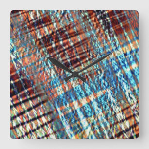 Blue and brown strokes rustically crossed in silky square wall clock