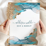 Blue And Gold Modern Art Liquid Watercolor Ink Planner<br><div class="desc">Experience the elegance of modern art with this blue and gold liquid watercolor ink design. Perfect for business women, hair stylists, and makeup artists, this planner offers a blend of sophistication and functionality. The unique watercolor ink artwork adds a luxurious touch to your daily schedule. Ideal for those who appreciate...</div>