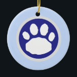 Blue and Grey Paw Print Ceramic Ornament<br><div class="desc">This round keepsake ornament features a large animal paw print in colours inspired by the Hanukkah season. Make it uniquely yours by adding a name or your customized message. See more gift ideas for your favourite four-legged friends and their pet parents at zazzle.com/paws_for_celebration . Pin or bookmark this page to...</div>