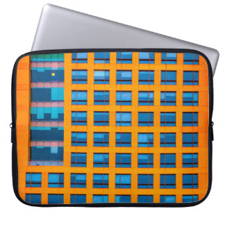 Blue and orange building laptop sleeve