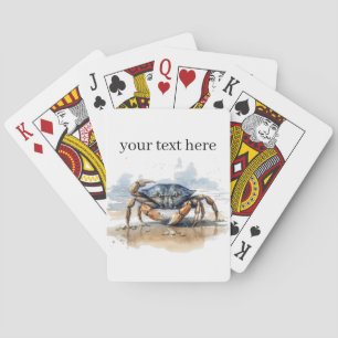 blue and orange crab walking on the beach  playing cards