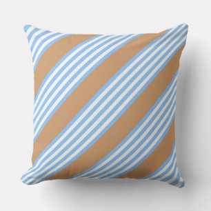 Blue and white five stripes pattern with tan throw pillow