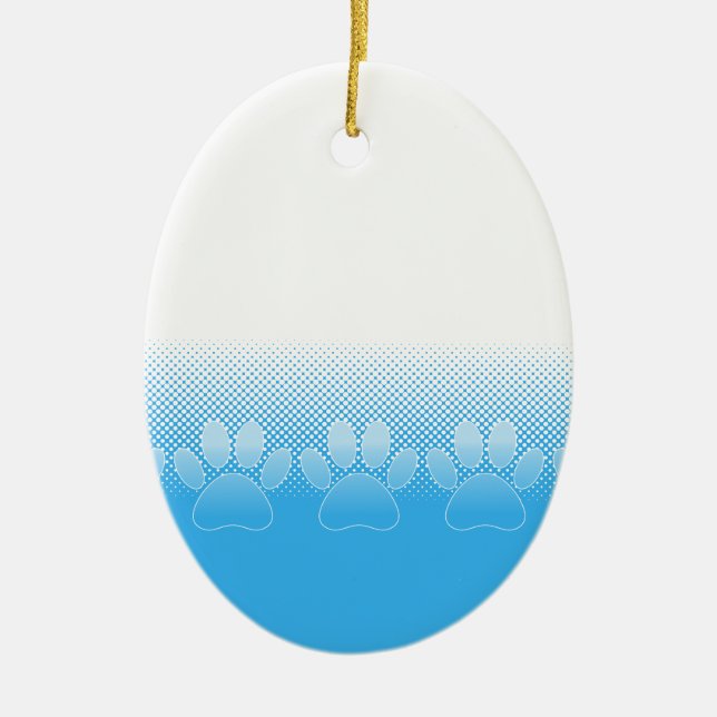 Blue And White Paws With Newsprint Background Ceramic Ornament (Front)
