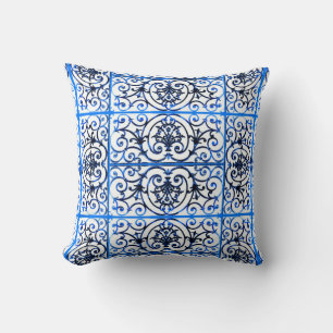 Blue and white scrollwork pattern throw pillow