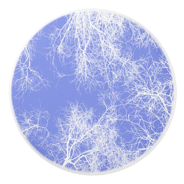 Blue and white silhouetted trees ceramic knob (Front)
