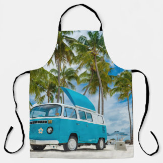 Blue and white van on beach apron