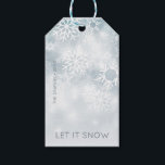 Blue and White Winter Snow Gift Tags<br><div class="desc">This gift tag features a soft dusty blue background with softly falling white snowflakes. Personalize it with your family name and the year. Perfect for Christmas or Hanukkah gifts. Created by Simply Farmhouse Press.</div>