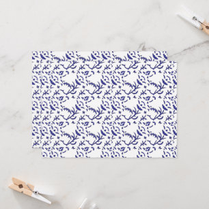 Blue and white wrapping paper featuring a graphic  invitation