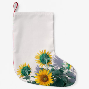 Blue and yellow flowers on white wall small christmas stocking