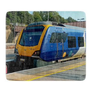 Blue and yellow train cutting board