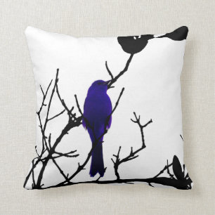 Blue bird on black tree throw pillow