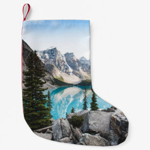 BLUE BODY OF WATER NEAR GREY MOUNTAIN DURING DAYTI SMALL CHRISTMAS STOCKING