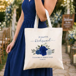Blue Boho Chic Roses Bridesmaid Wedding Favor Tote Bag<br><div class="desc">These beautiful tote bags are a wonderful way to thank your bridesmaids for being part of your wedding party. They feature a lovely boho chic floral design with a cluster of hand painted watercolor roses in shades of royal, navy, and dusty blue, surrounded by sprigs of eucalyptus leaves and garden...</div>