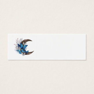 Blue butterflies on wooden crescent
